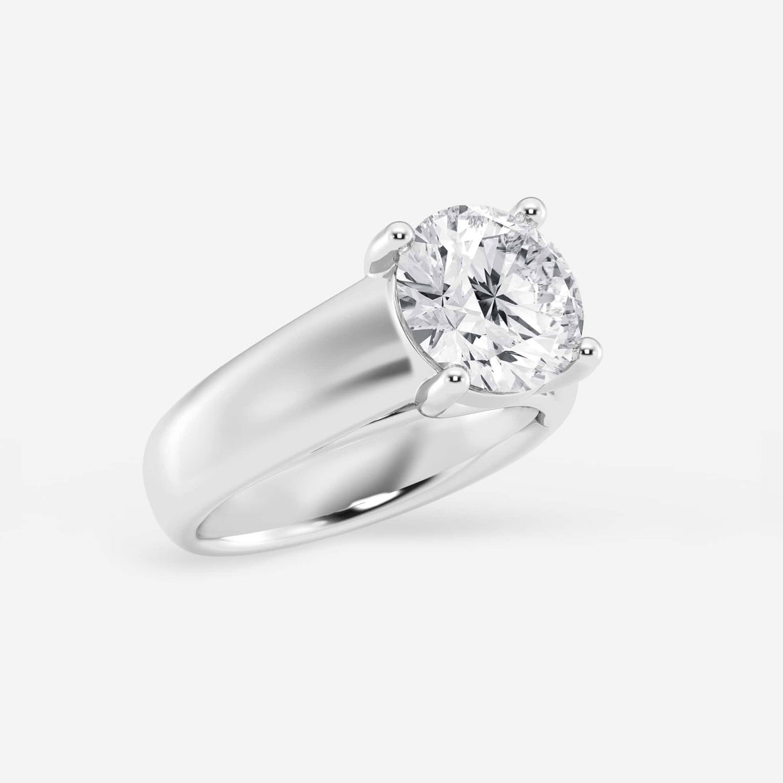 Bold Tapered Solitaire Engagement Ring in White Gold with Round Brilliant Center Stone