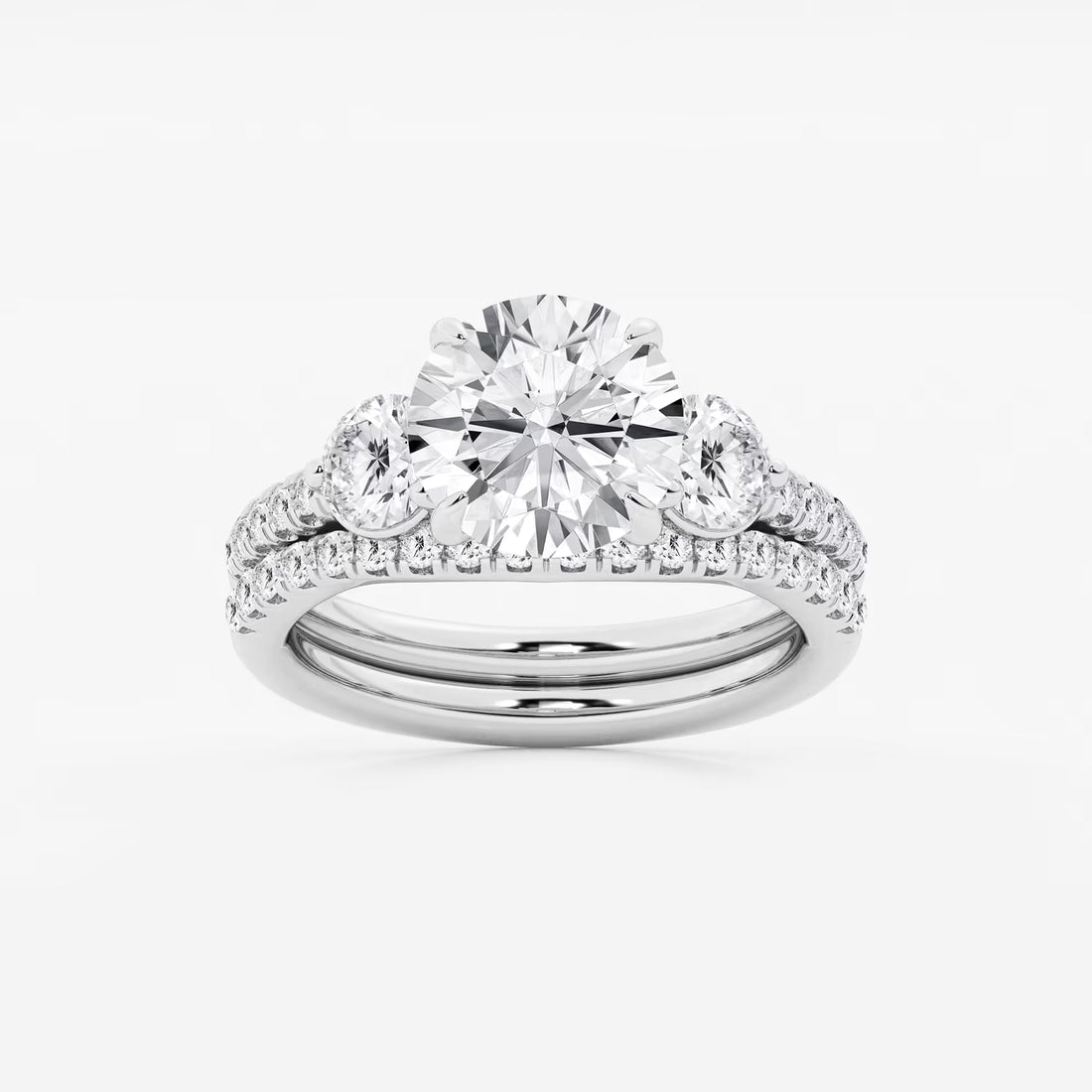 Three Stone Pavé Engagement Ring in White Gold with Round Brilliant Center Stone