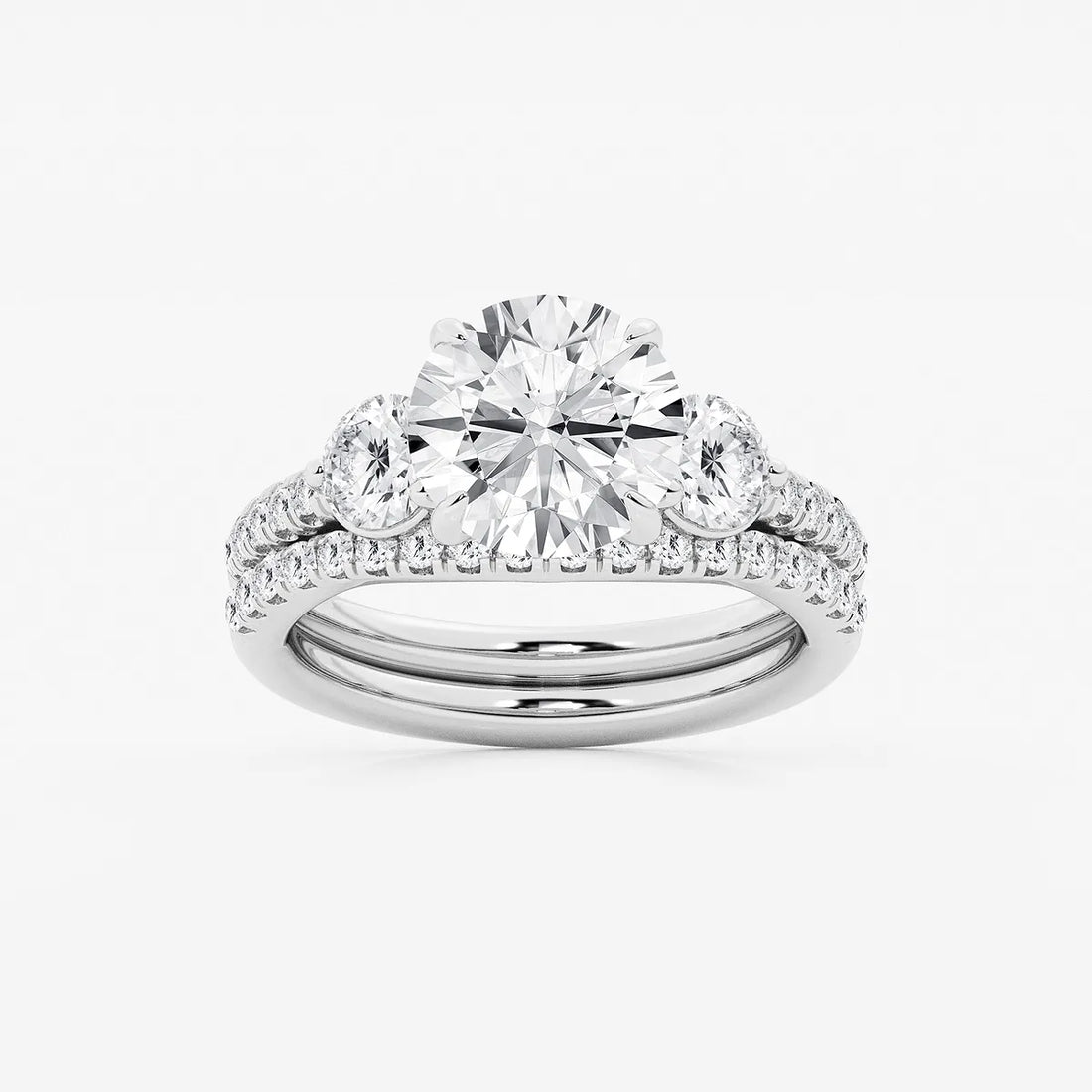 Three Stone Pavé Engagement Ring in White Gold with Round Brilliant Center Stone