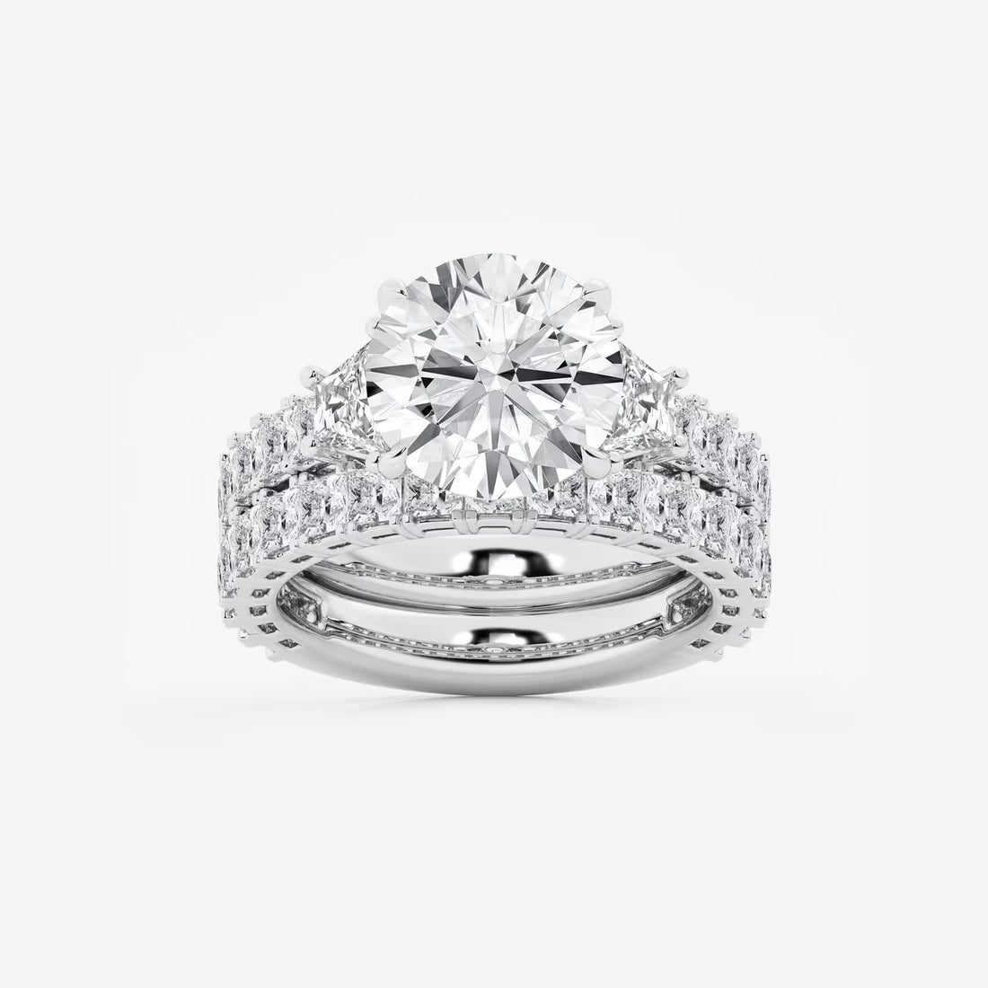 Three Stone Bridal Set in White Gold with Round Brilliant Center Stone and Trillion Side Stones