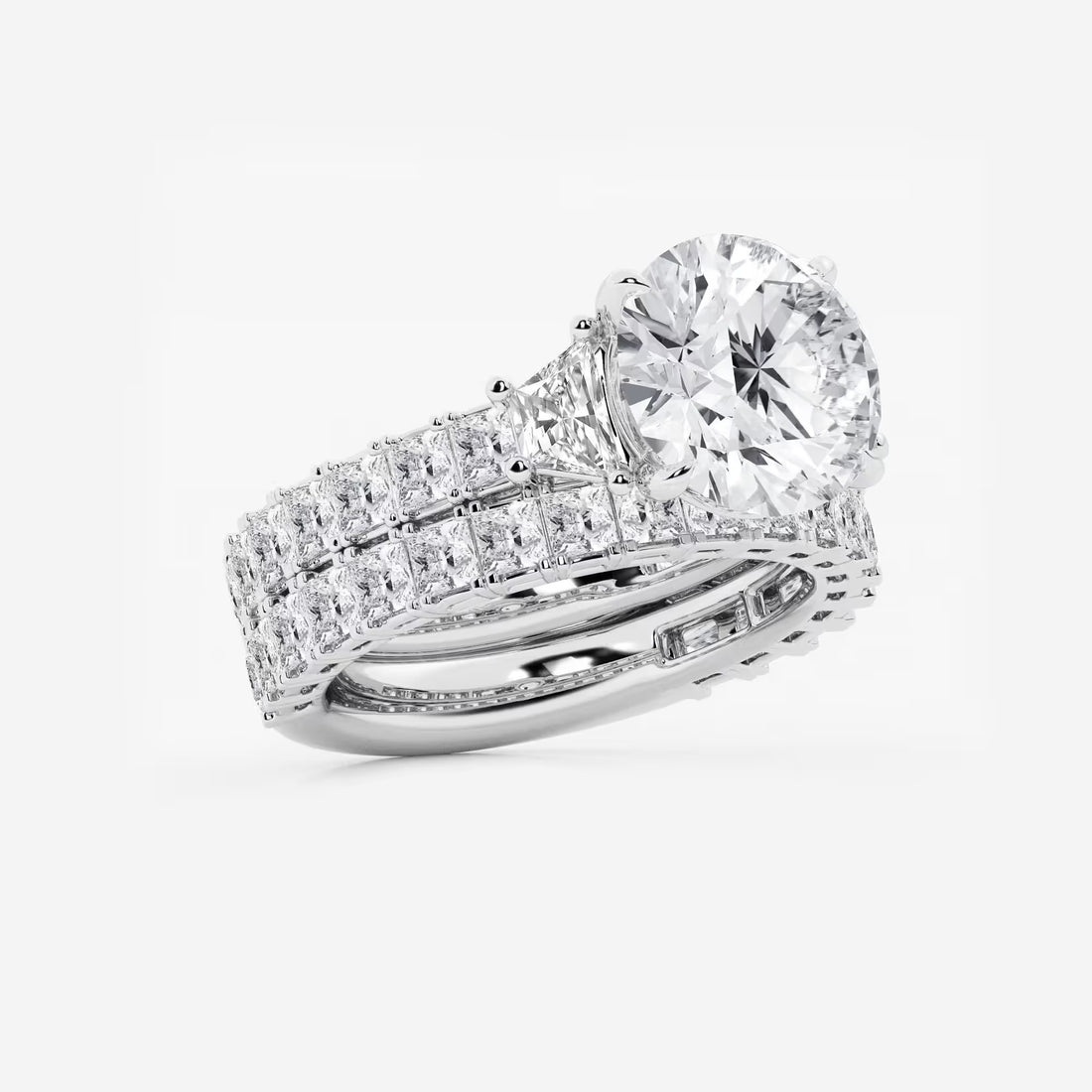 Three Stone Bridal Set in White Gold with Round Brilliant Center Stone and Trillion Side Stones