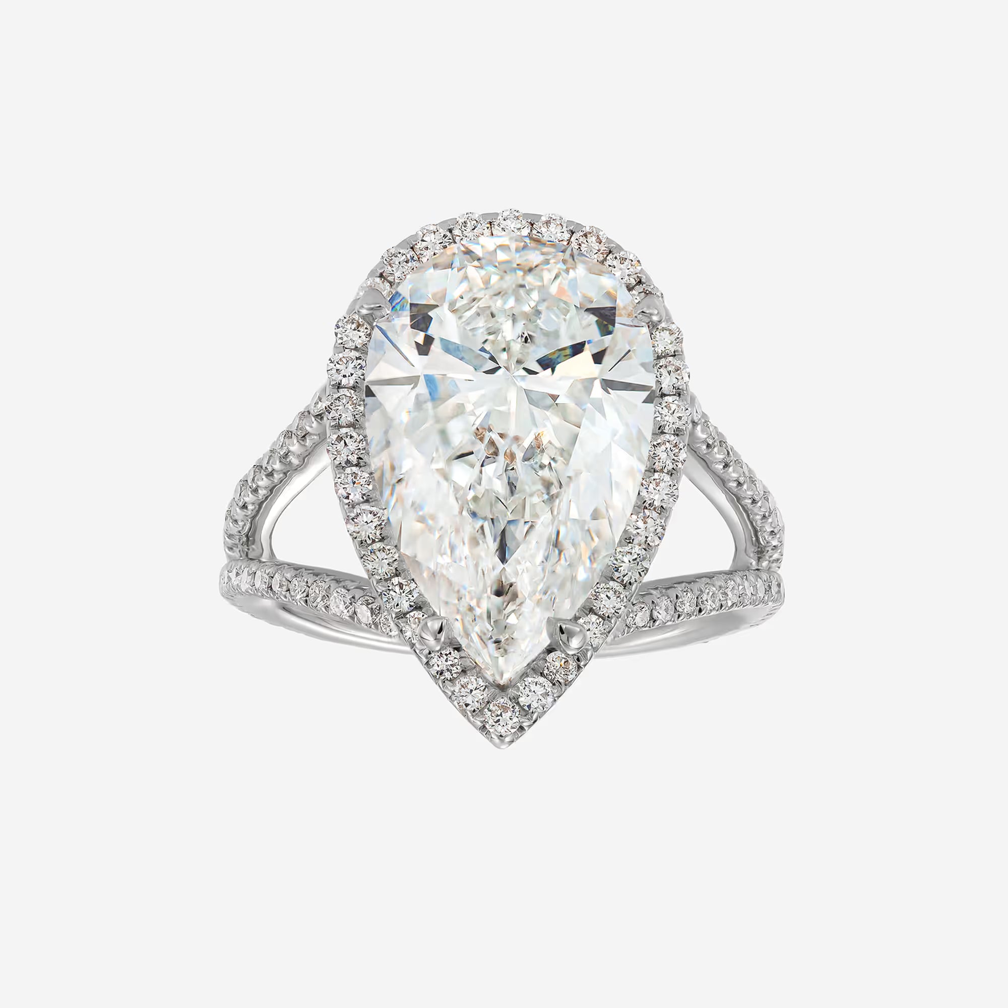 Pear Shaped Diamond Halo Engagement Ring in White Gold, Pave Side Stones
