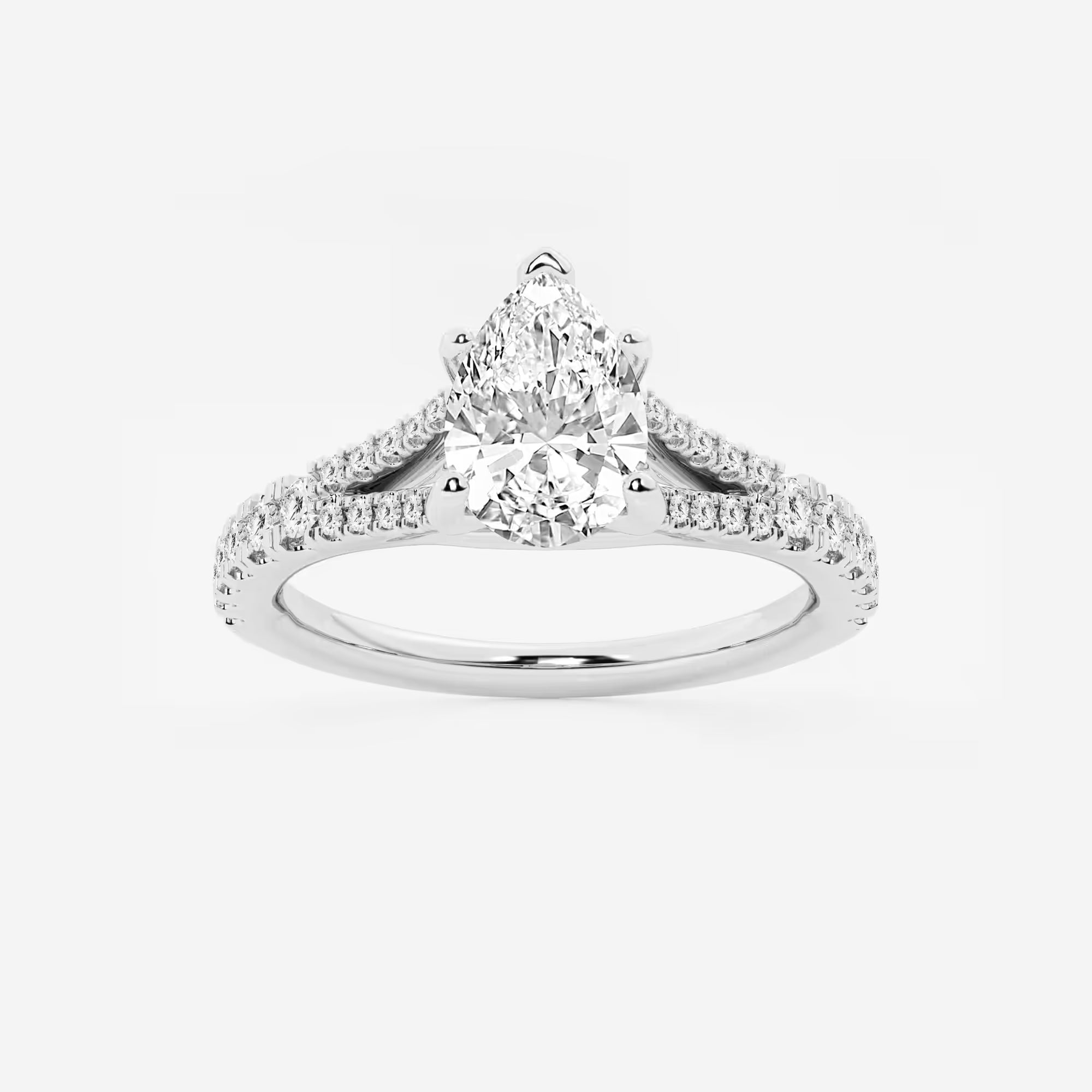 This handcrafted engagement ring features a brilliant pear cut lab-grown diamond