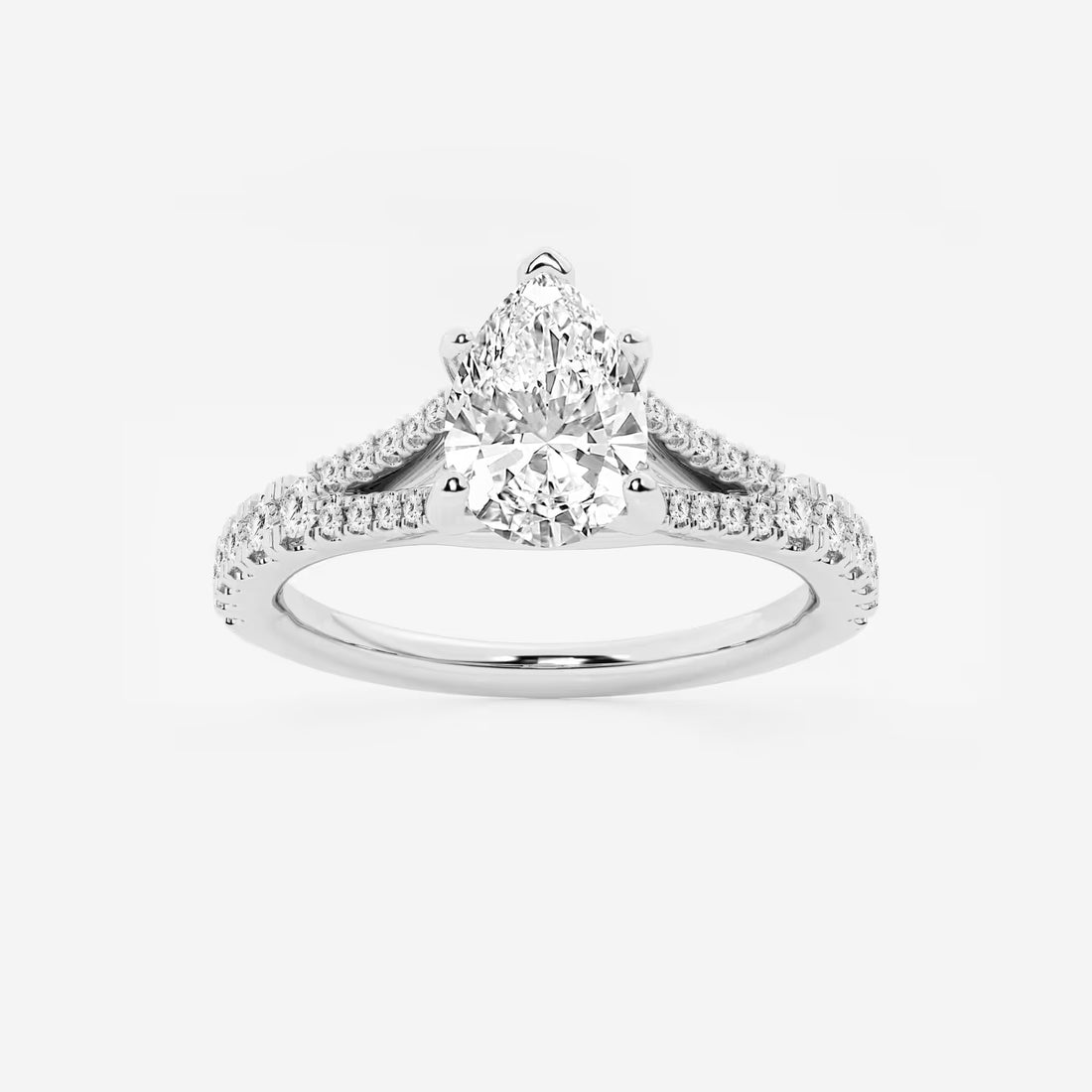 This handcrafted engagement ring features a brilliant pear cut lab-grown diamond