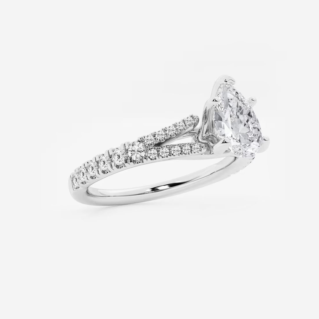 This handcrafted engagement ring features a brilliant pear cut lab-grown diamond