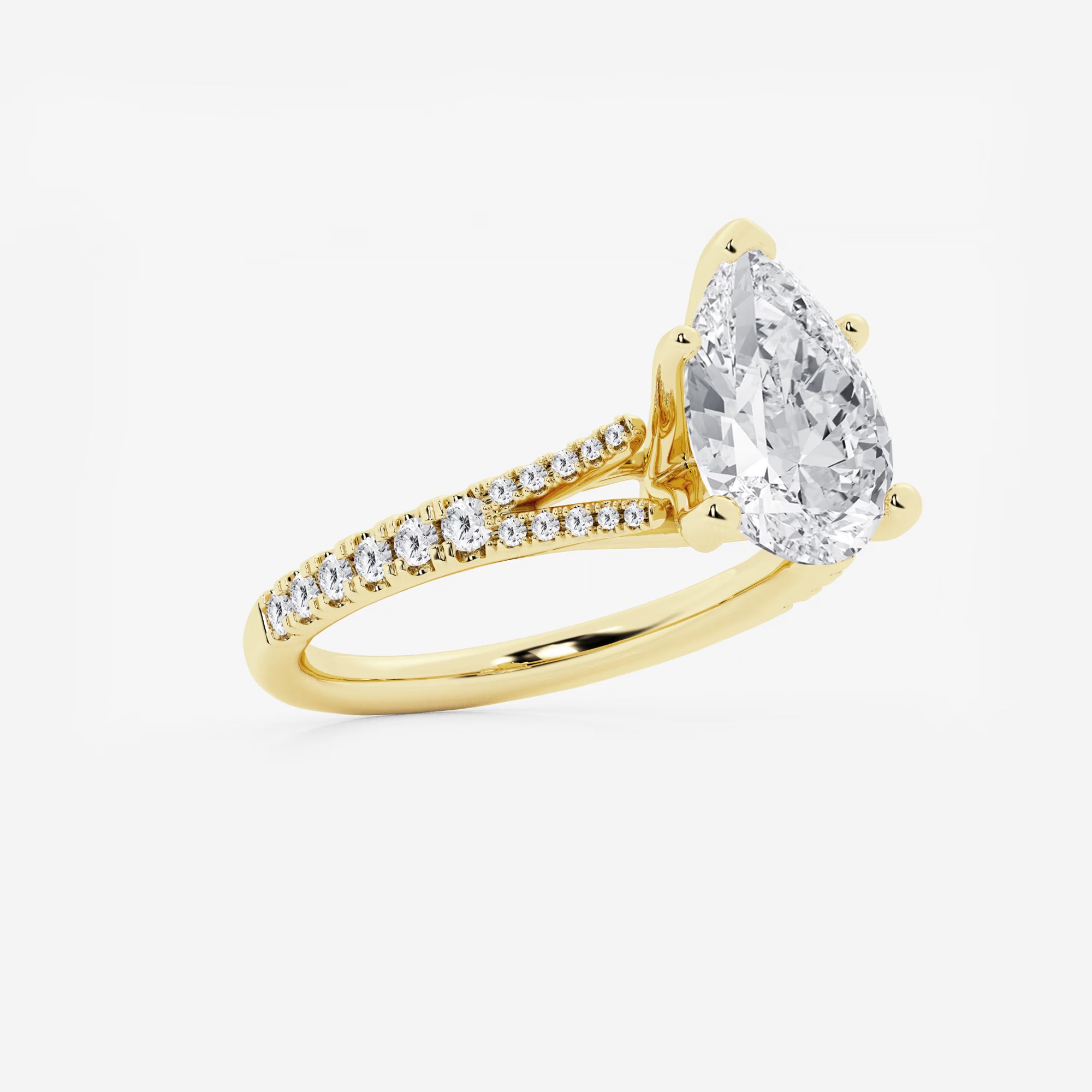 This handcrafted engagement ring features a brilliant pear cut lab-grown diamond