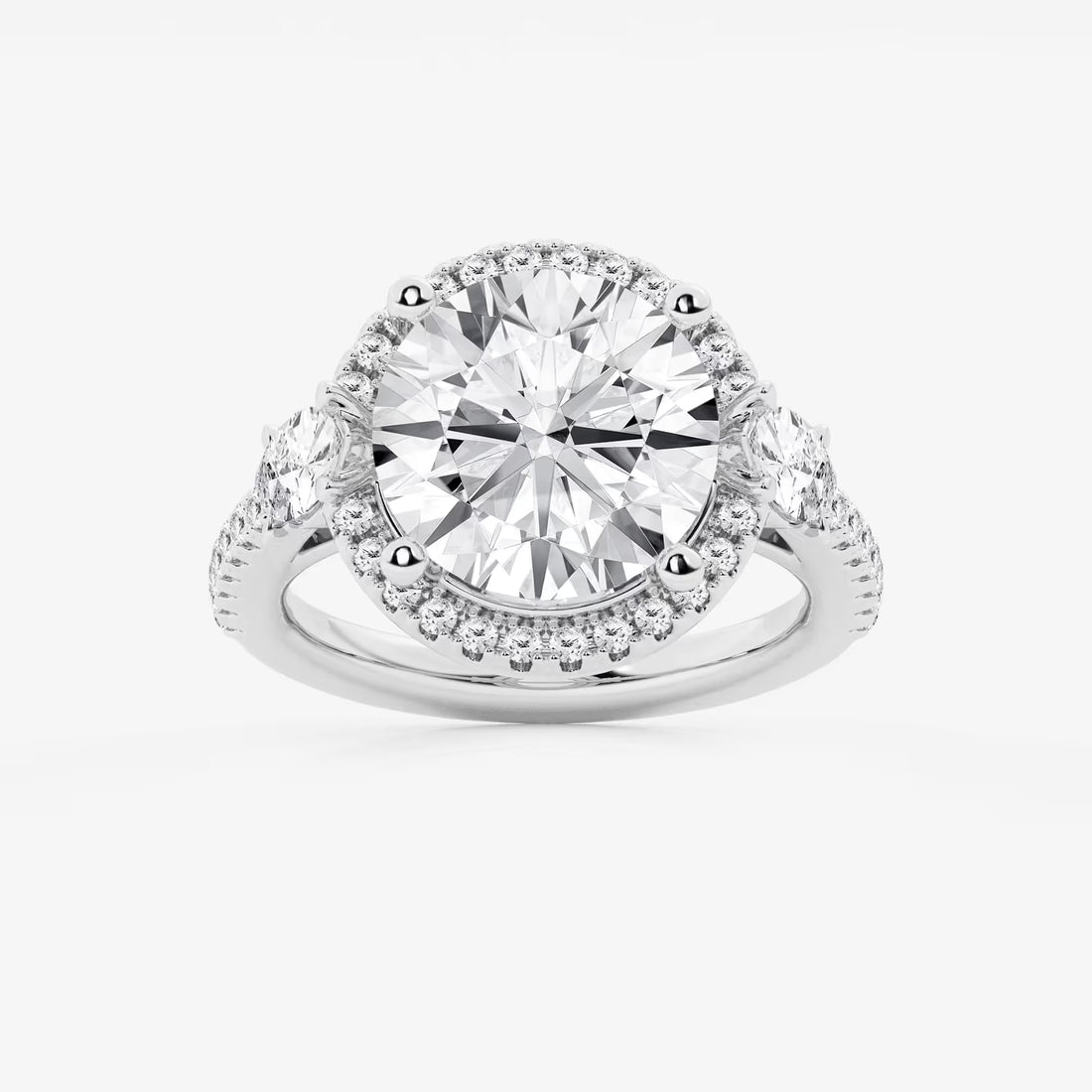 Three Stone Halo Engagement Ring in White Gold with Round Brilliant Center Stone