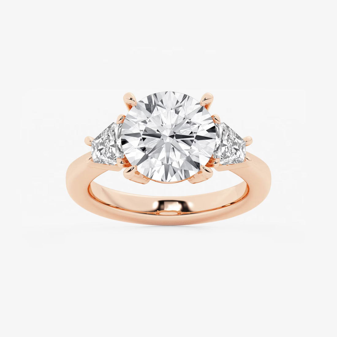 Three Stone Trillion Cut Engagement Ring in White Gold with Round Brilliant Center Stone