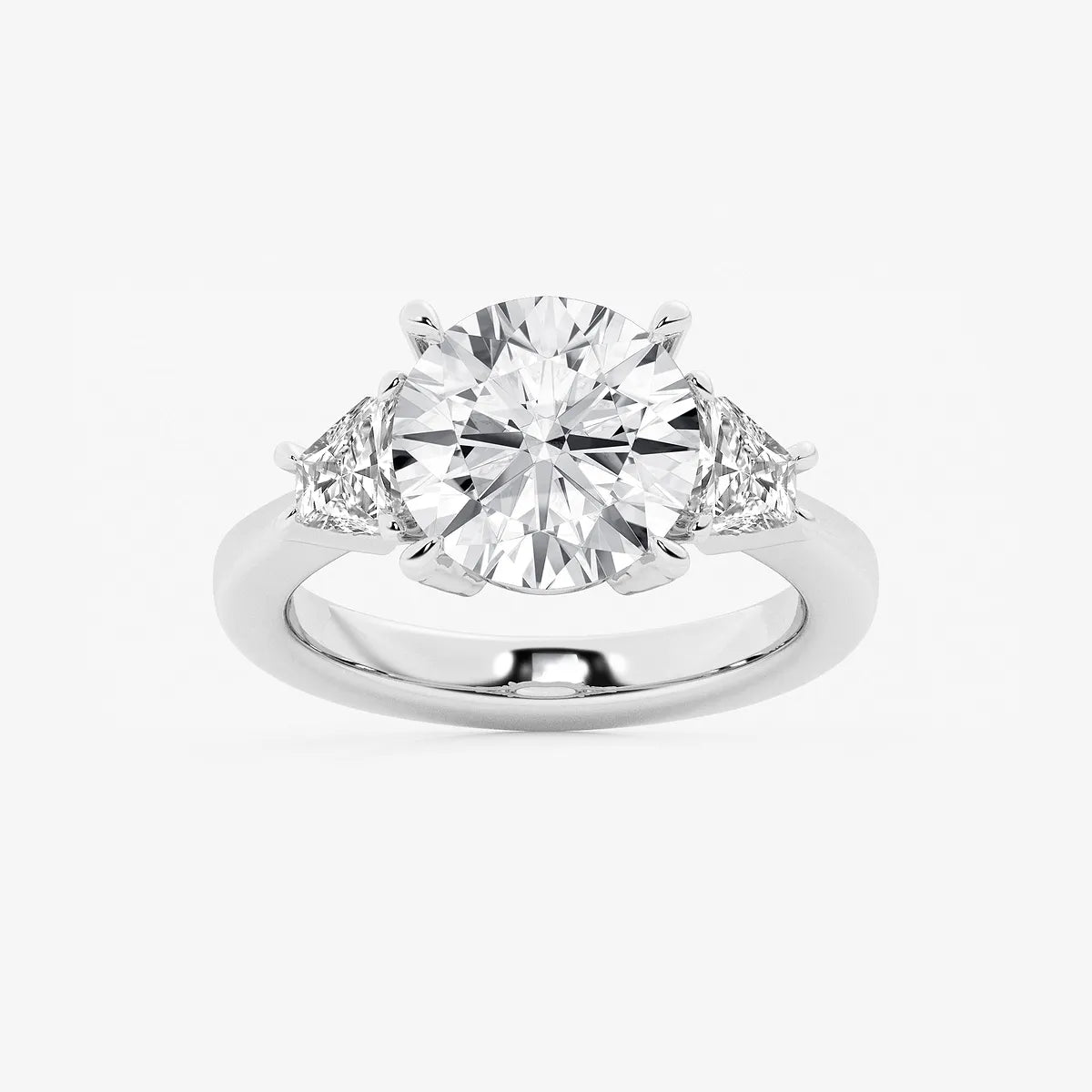 Three Stone Trillion Cut Engagement Ring in White Gold with Round Brilliant Center Stone