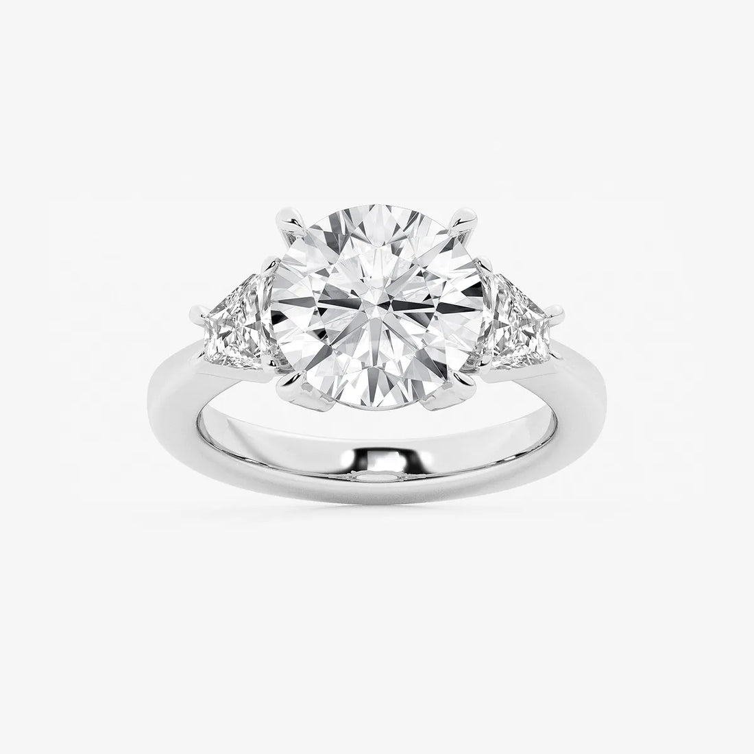 Three Stone Trillion Cut Engagement Ring in White Gold with Round Brilliant Center Stone