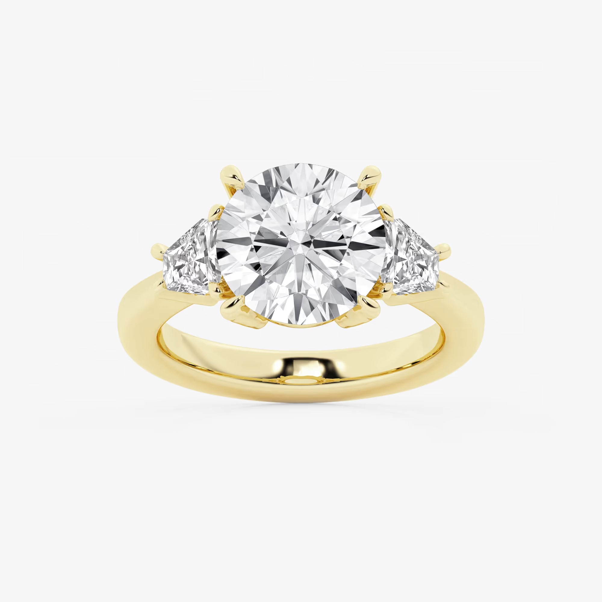 Three Stone Trillion Cut Engagement Ring in White Gold with Round Brilliant Center Stone