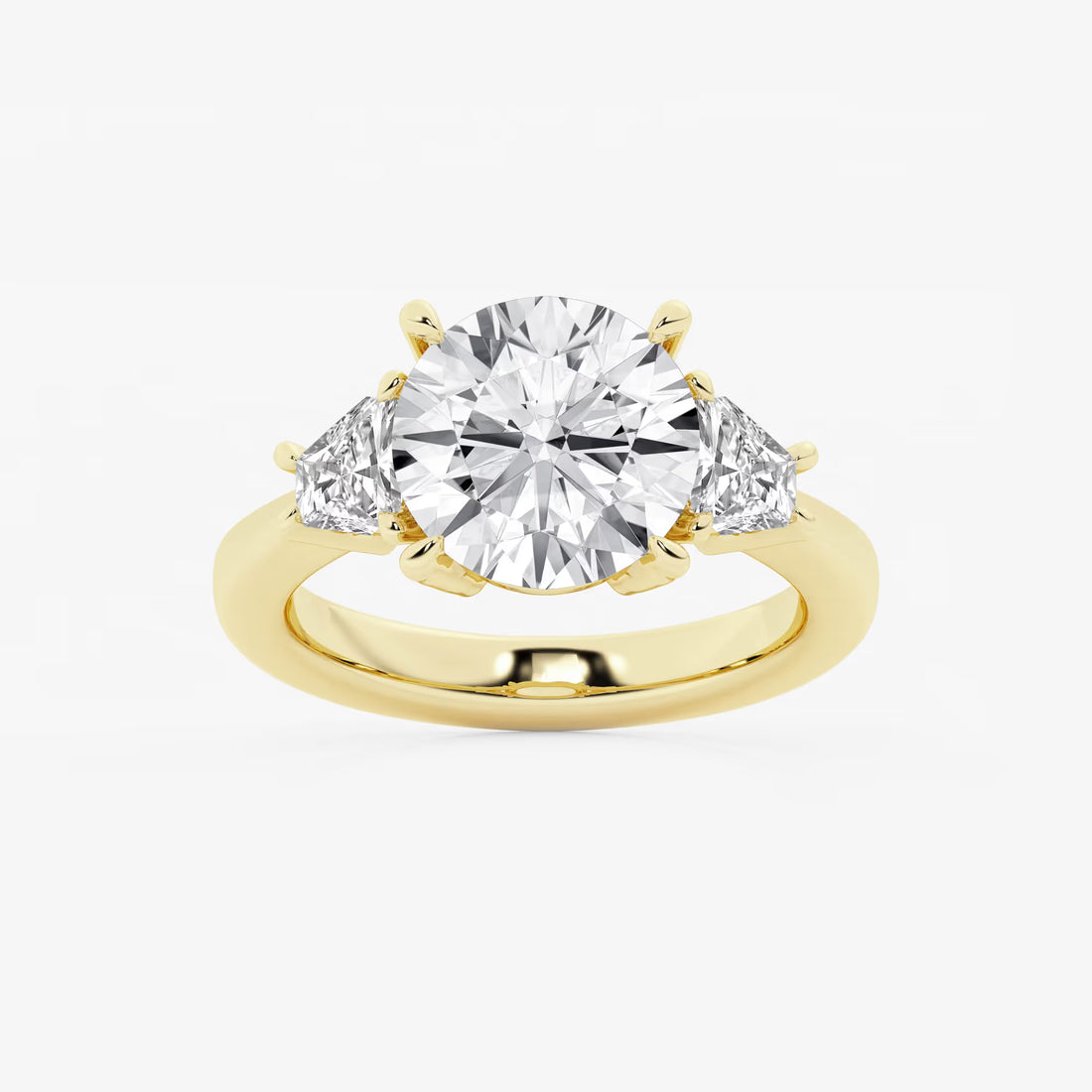 Three Stone Trillion Cut Engagement Ring in White Gold with Round Brilliant Center Stone