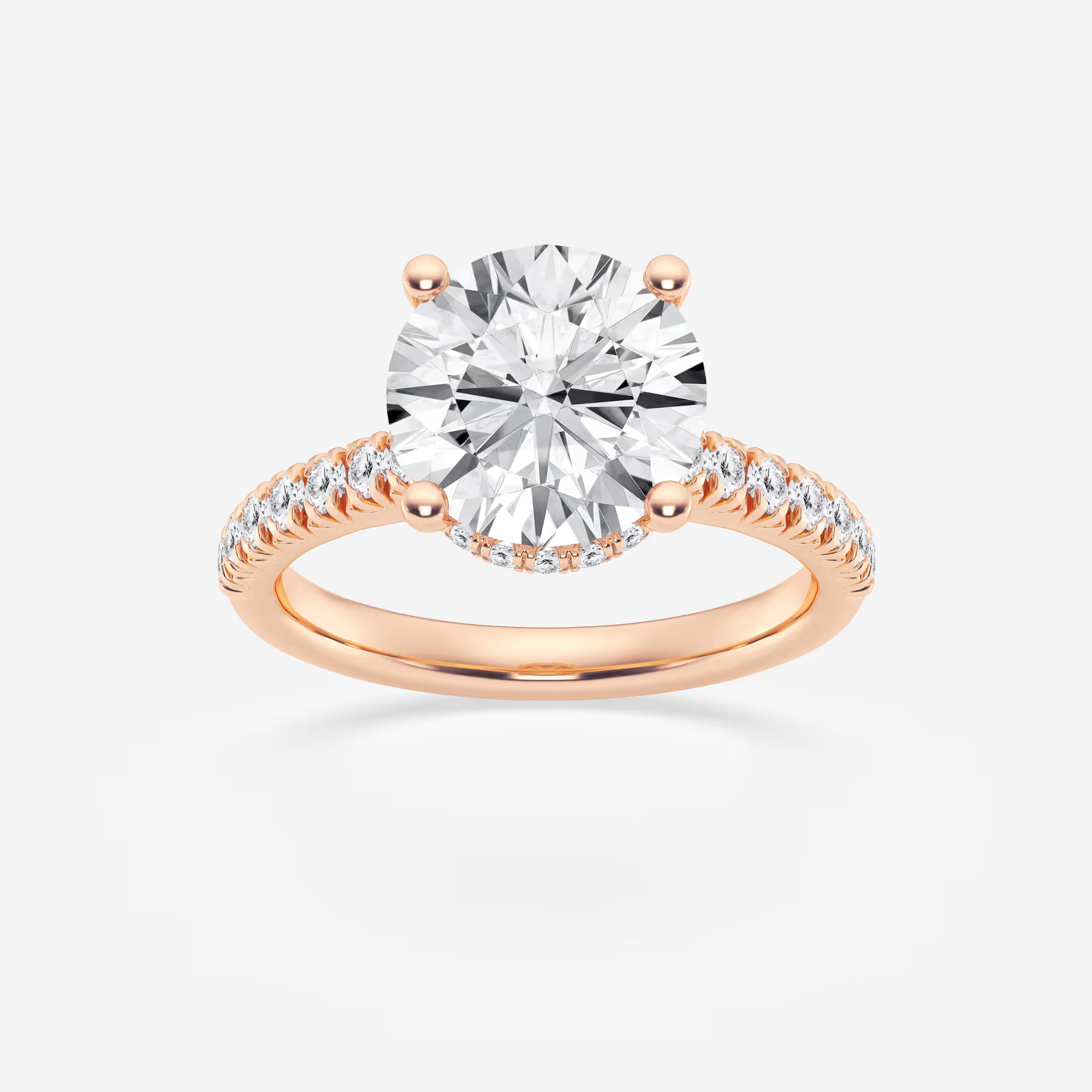 Round Brilliant Lab Diamond Solitaire Ring with a Secret Diamond Basket