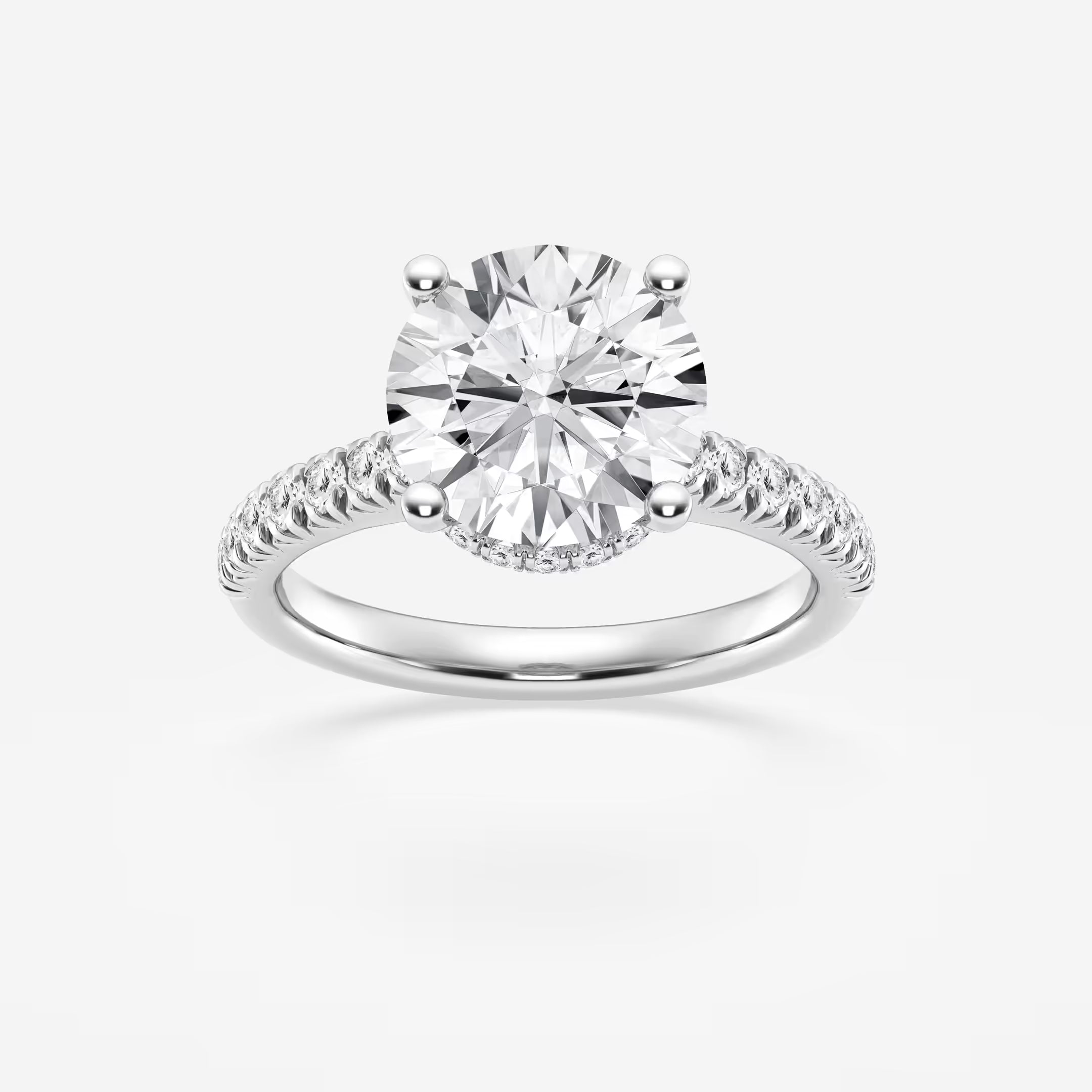 Round Brilliant Lab Diamond Solitaire Ring with a Secret Diamond Basket