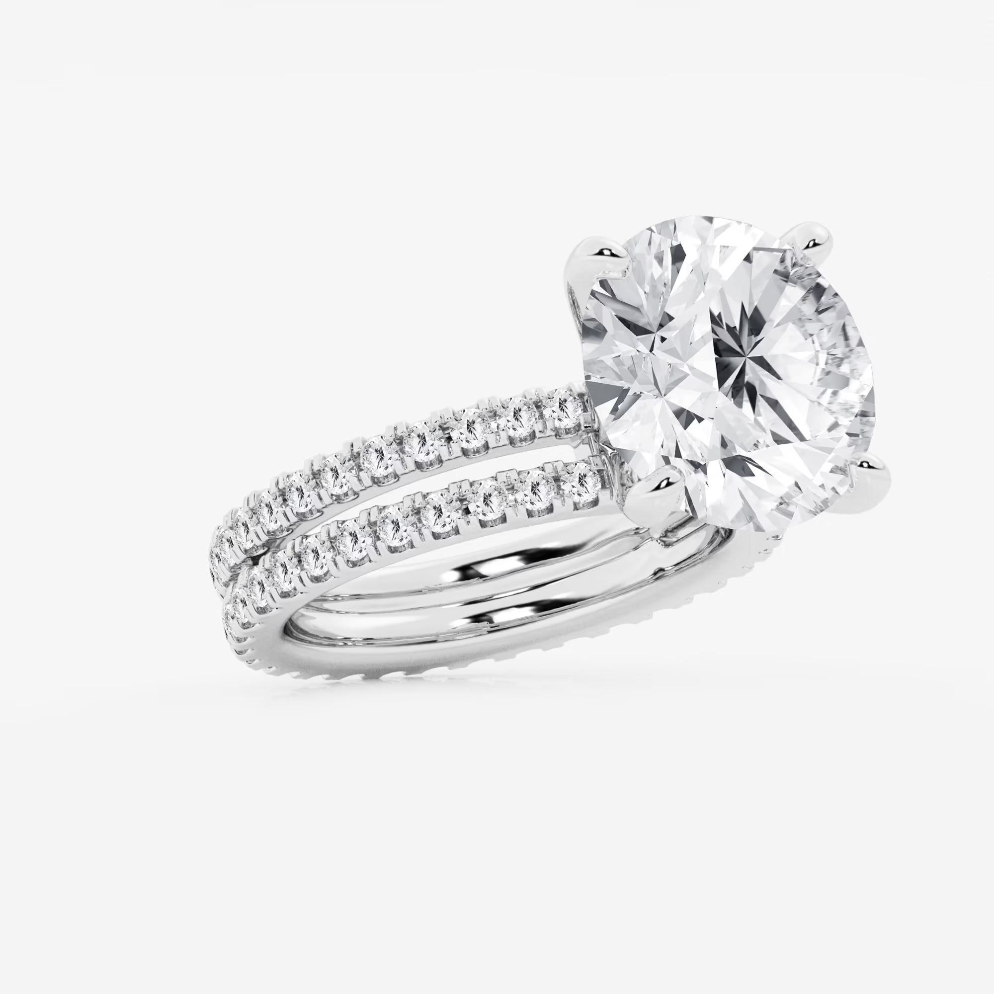 Pavé Eternity Bridal Set in White Gold with Round Brilliant Center Stone