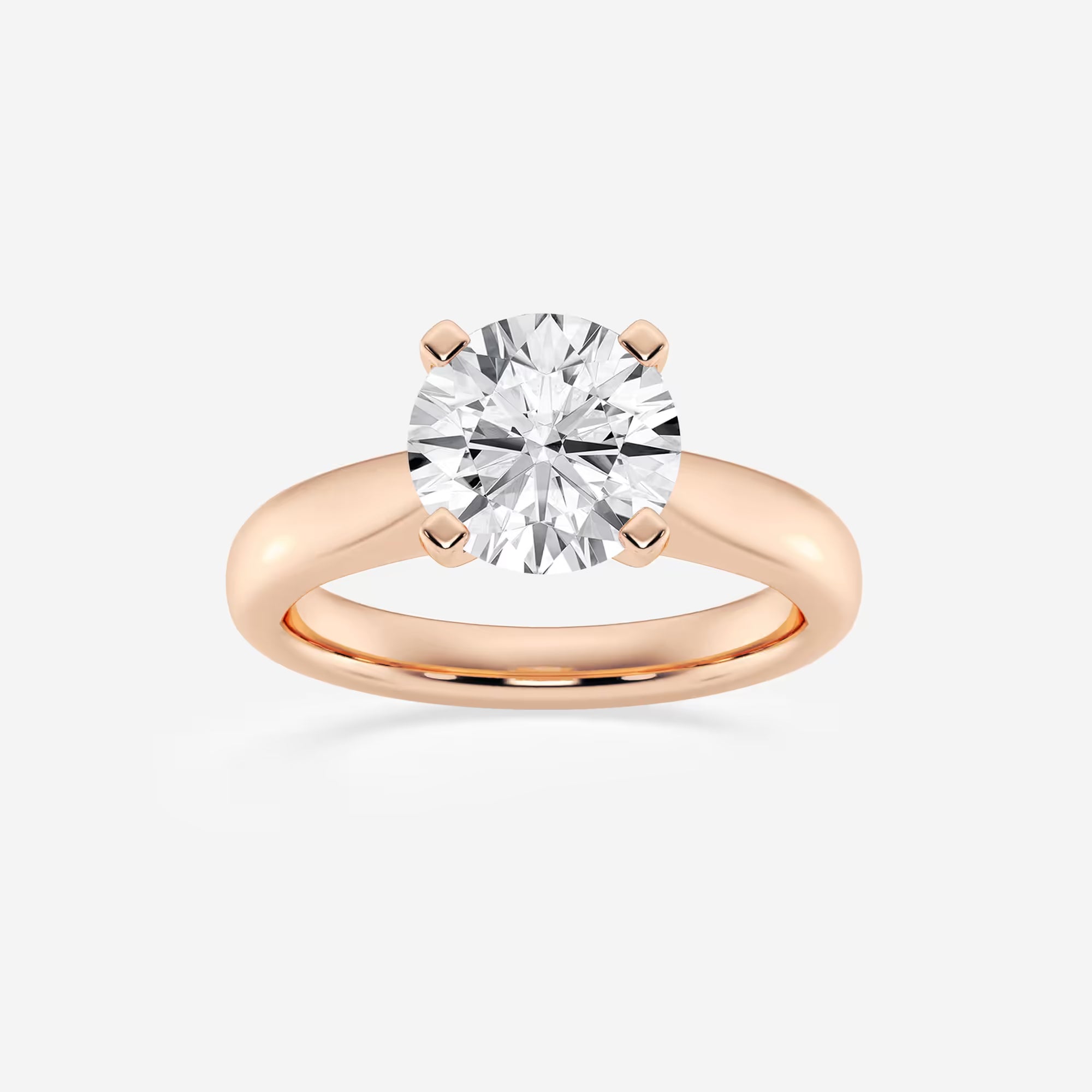 Classic Tapered Solitaire Engagement Ring in White Gold with Round Brilliant Center Stone