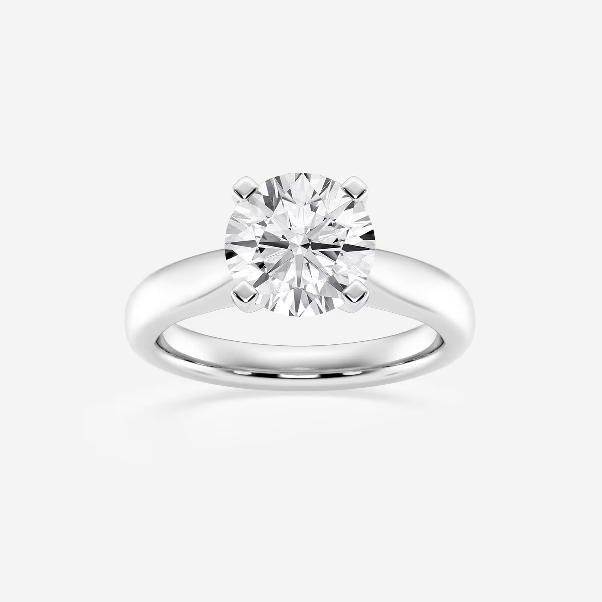 Classic Tapered Solitaire Engagement Ring in White Gold with Round Brilliant Center Stone