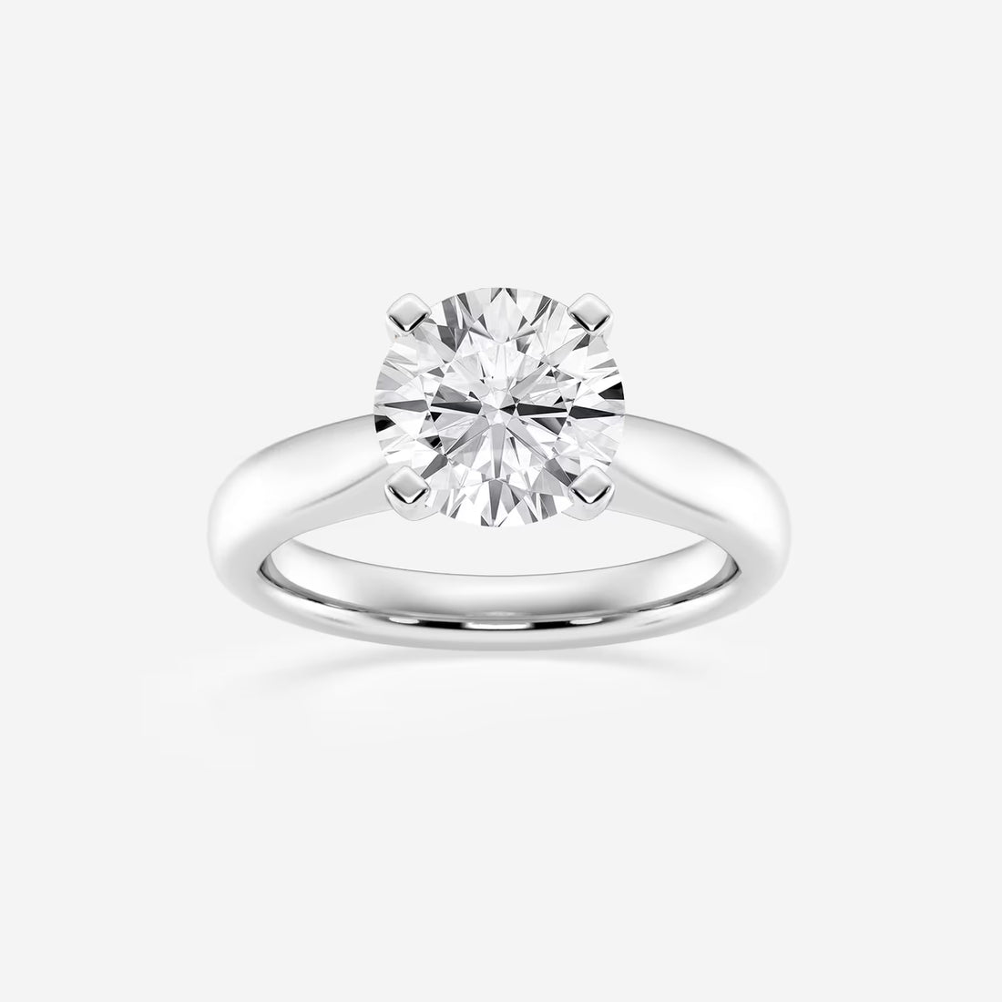 Classic Tapered Solitaire Engagement Ring in White Gold with Round Brilliant Center Stone