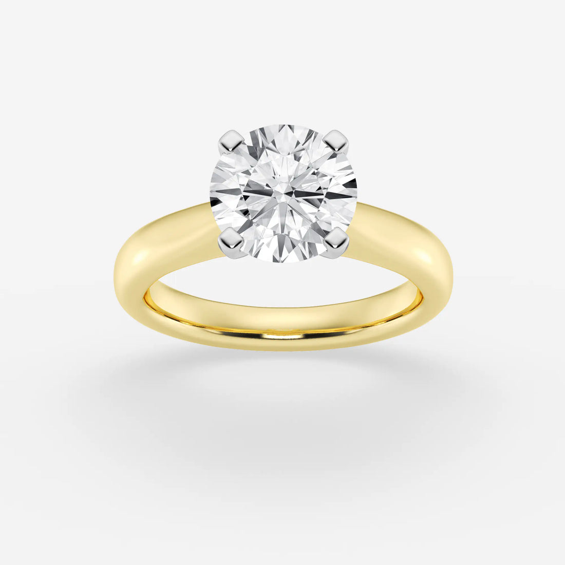 Classic Tapered Solitaire Engagement Ring in White Gold with Round Brilliant Center Stone