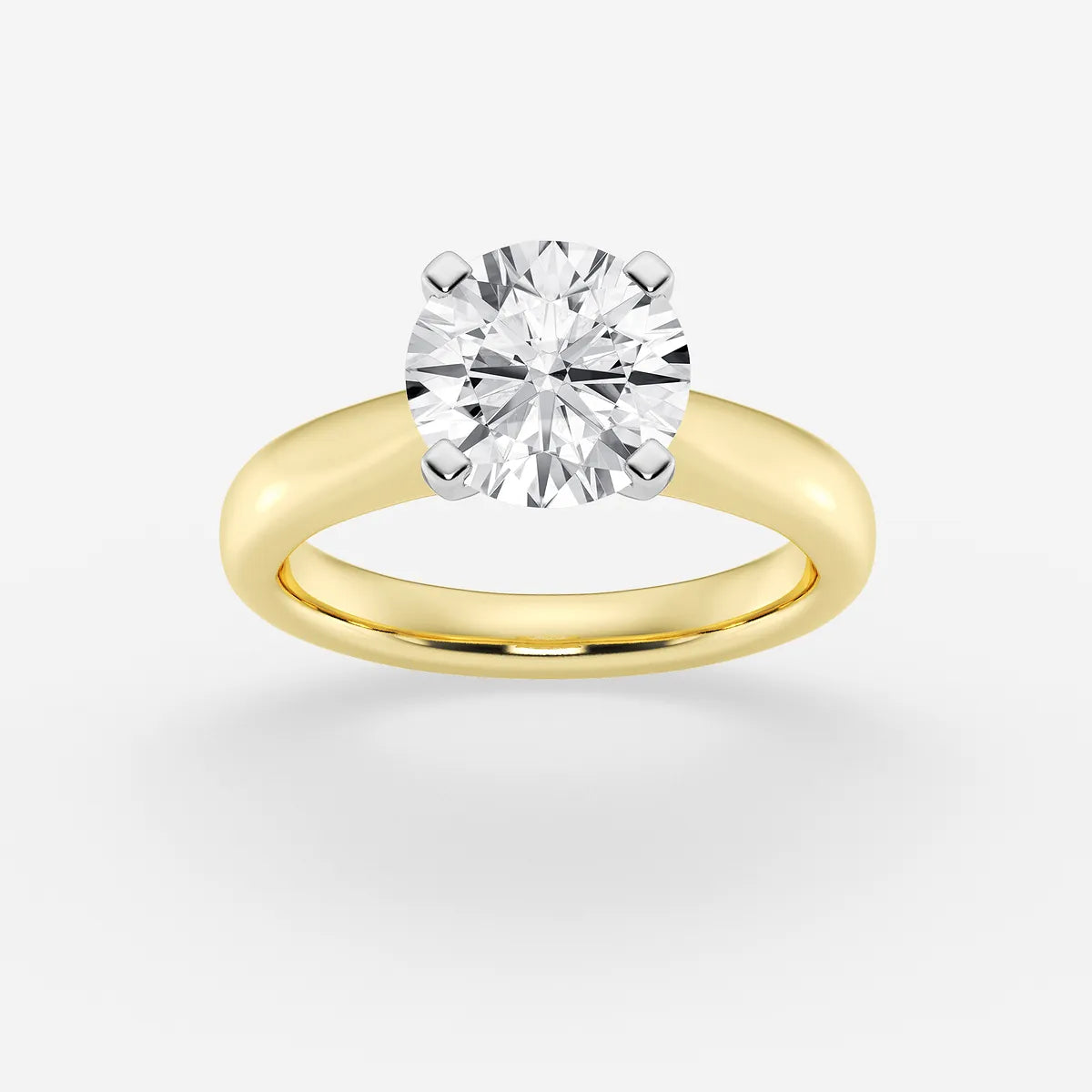 Classic Tapered Solitaire Engagement Ring in White Gold with Round Brilliant Center Stone