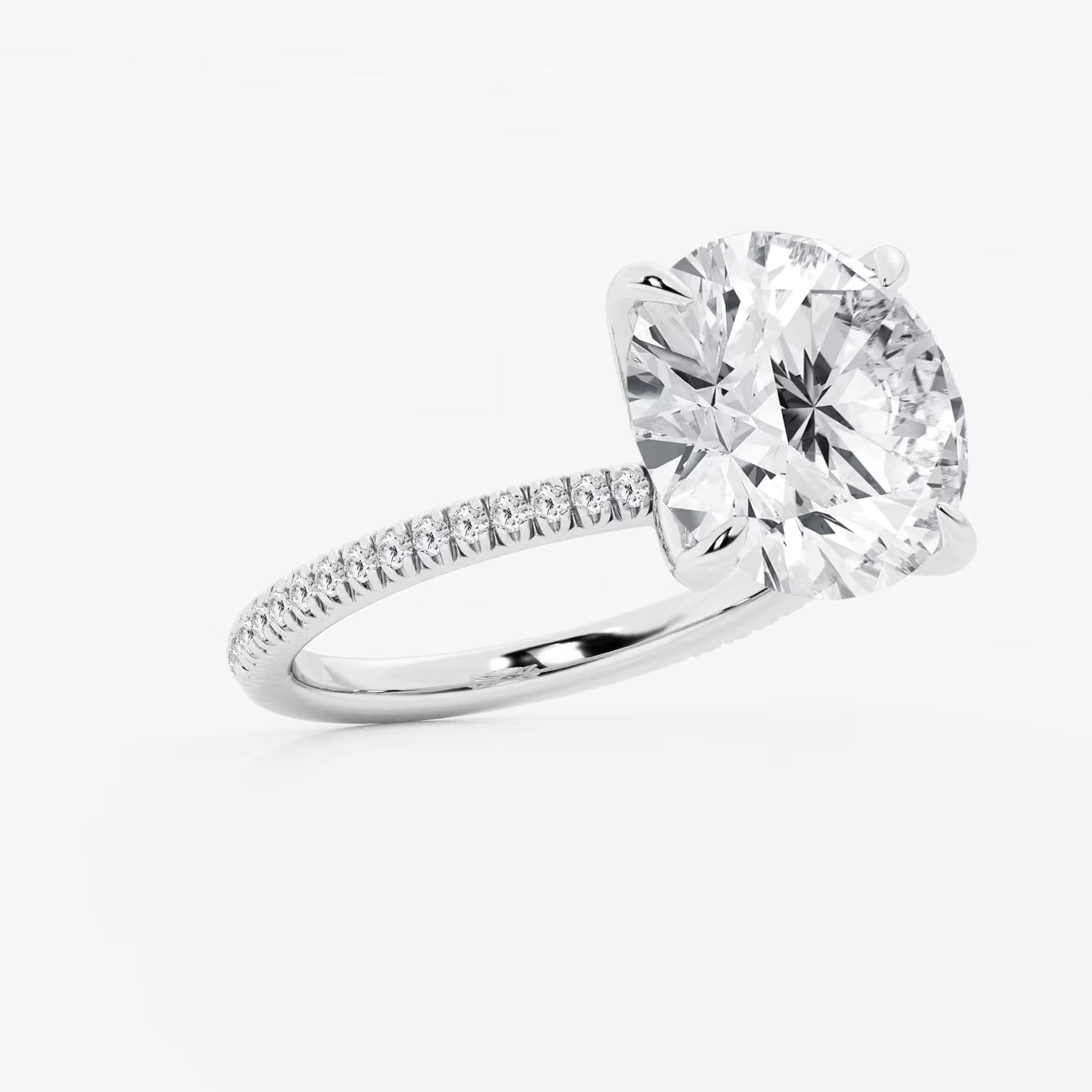 Single Row Pavé Engagement Ring in White Gold with Round Brilliant Center Stone