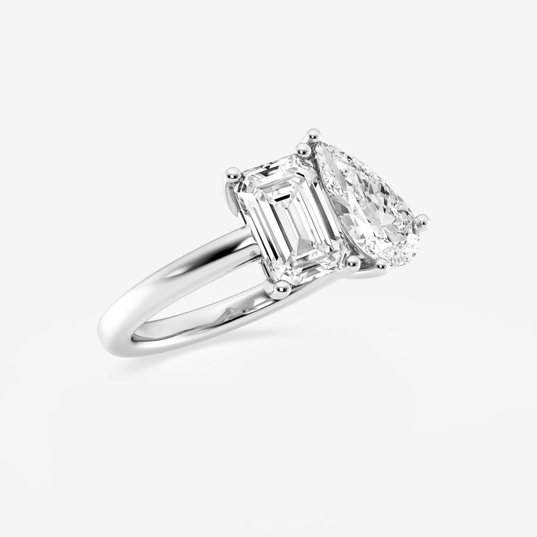 Toi et Moi Engagement Ring in White Gold with Emerald and Pear Cut Diamonds