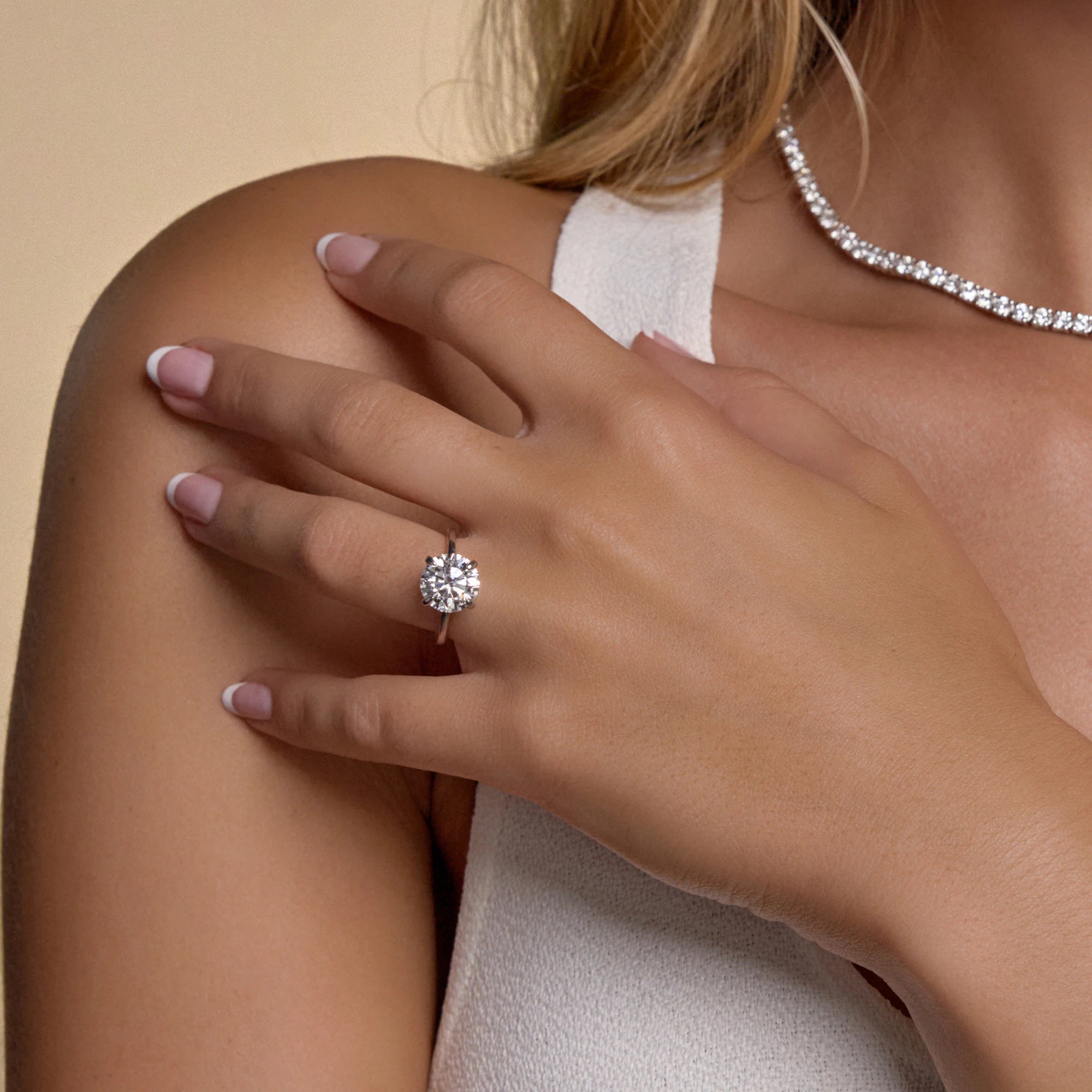 Classic Solitaire Engagement Ring in White Gold with Round Brilliant Center Stone