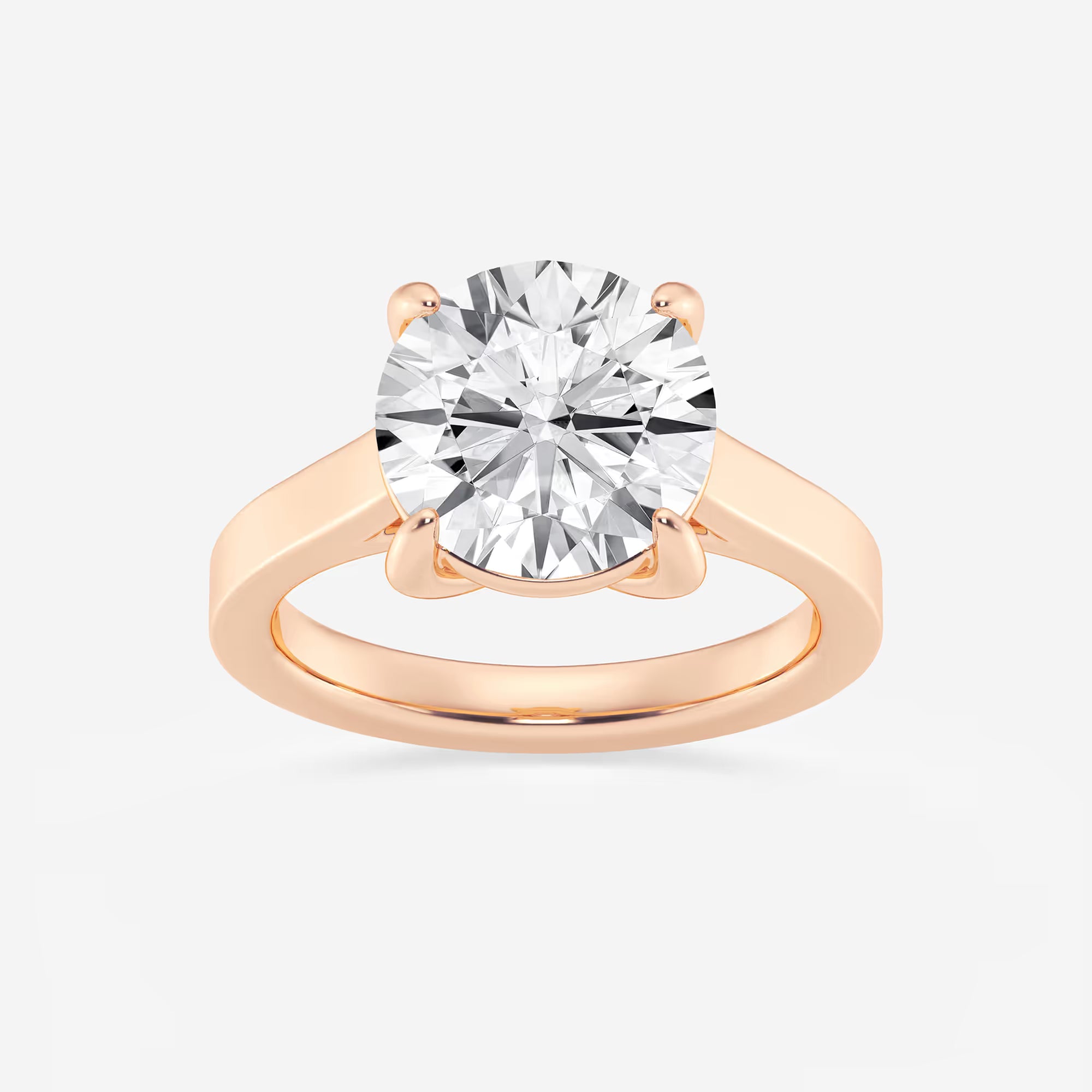 Classic Knife-Edge Solitaire Engagement Ring in White Gold with Round Brilliant Center Stone