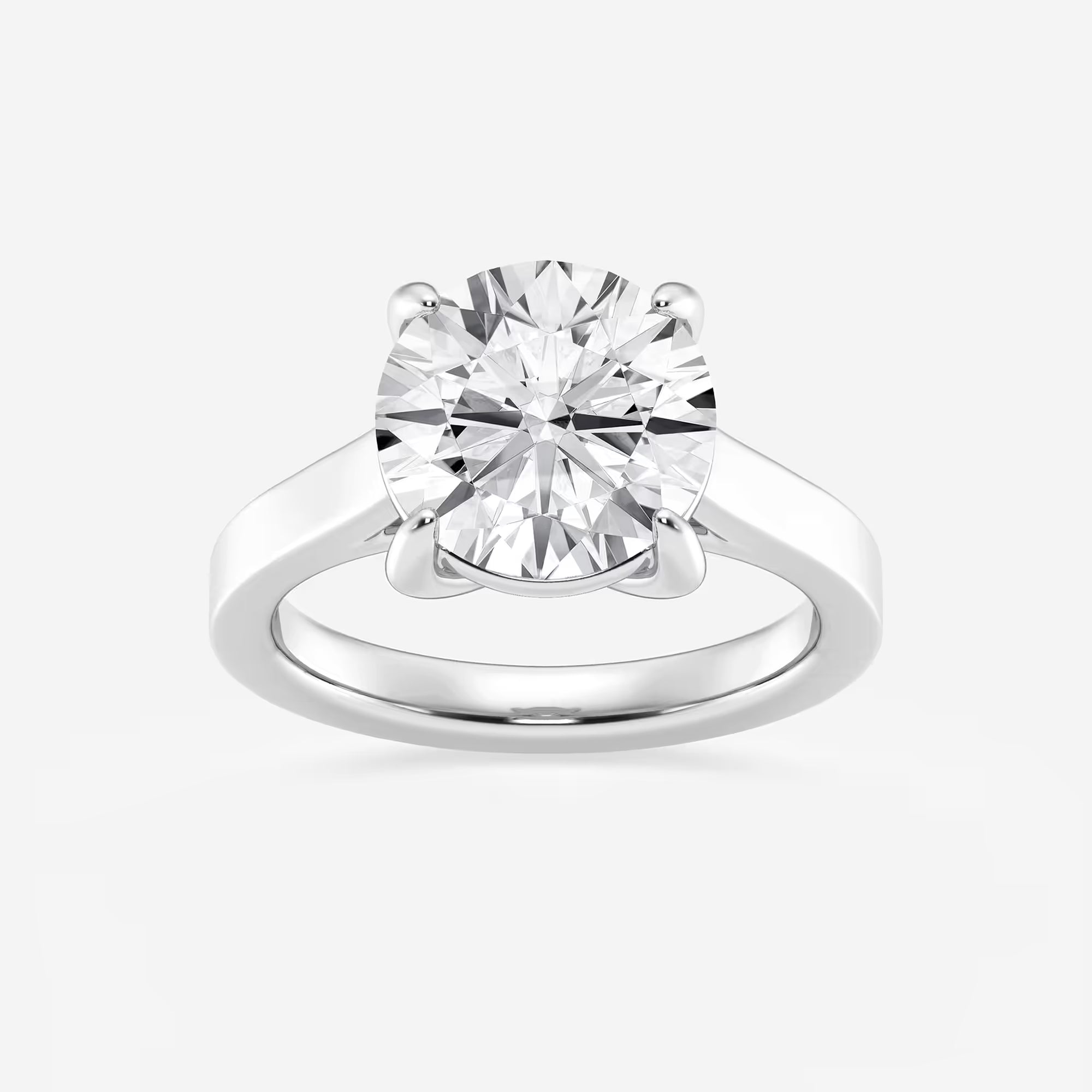 Modern Flat-Edge Solitaire Engagement Ring in White Gold with Round Brilliant Center Stone
