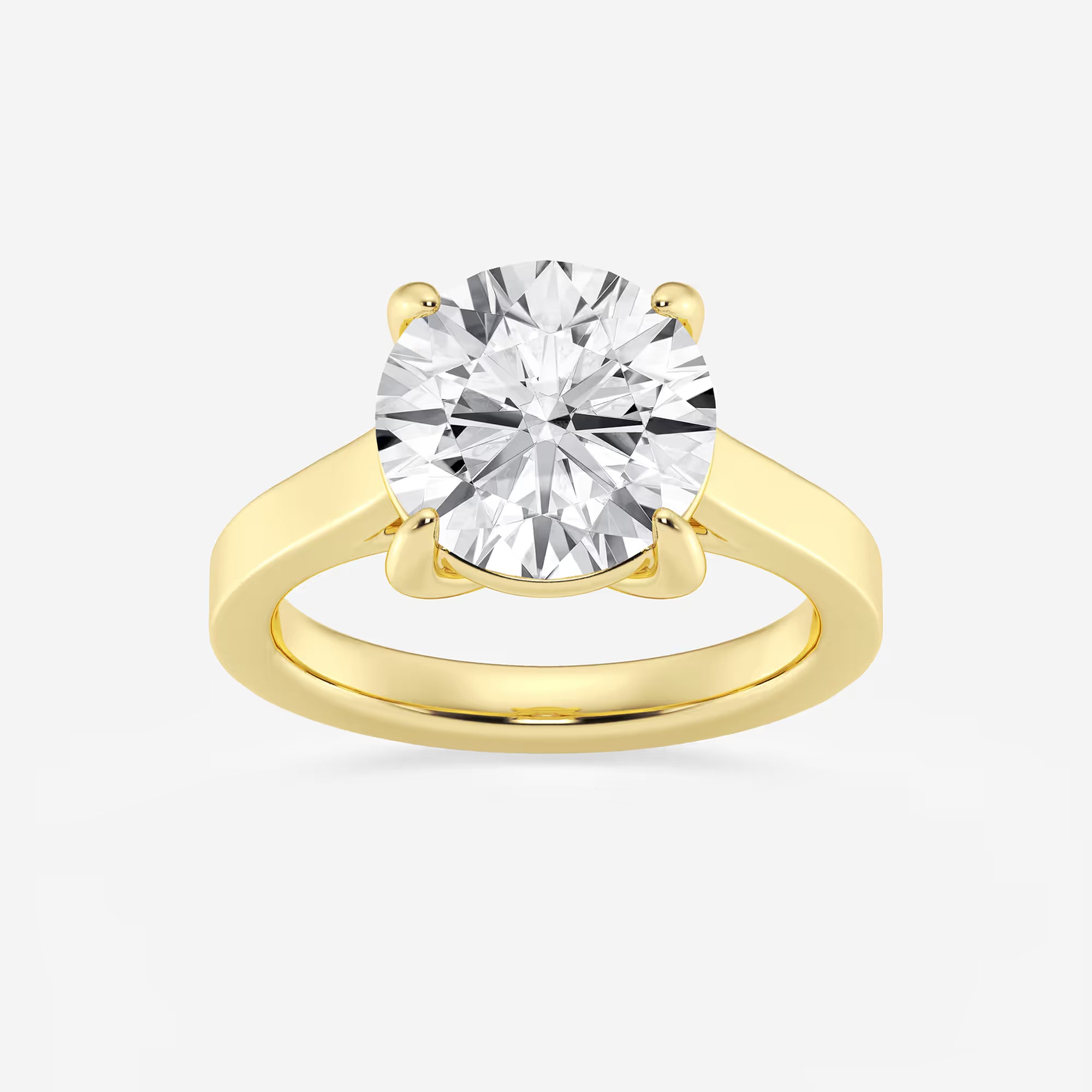 Classic Knife-Edge Solitaire Engagement Ring in White Gold with Round Brilliant Center Stone