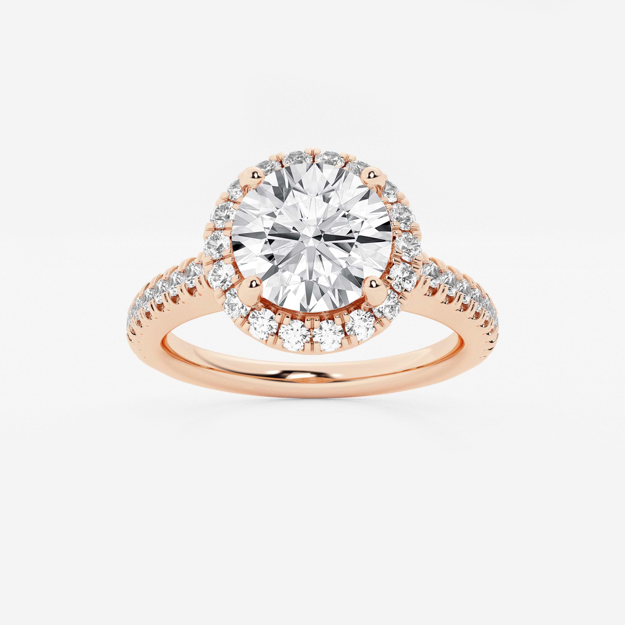 Halo Engagement Ring in White Gold with Round Brilliant Center Stone and Pavé Shank