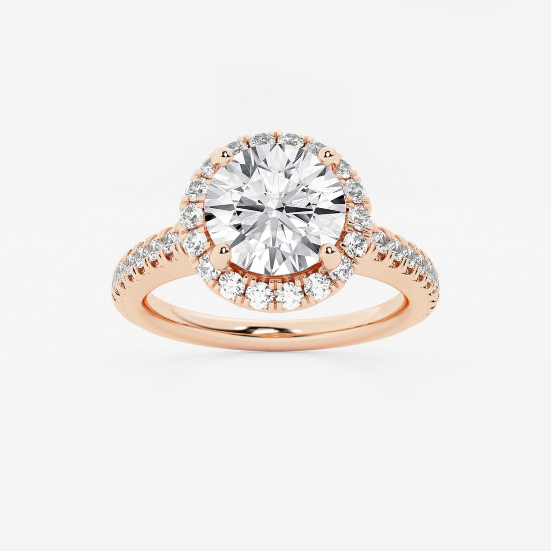 Halo Engagement Ring in White Gold with Round Brilliant Center Stone and Pavé Shank