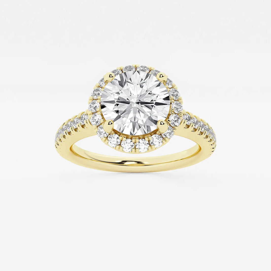 Halo Engagement Ring in White Gold with Round Brilliant Center Stone and Pavé Shank