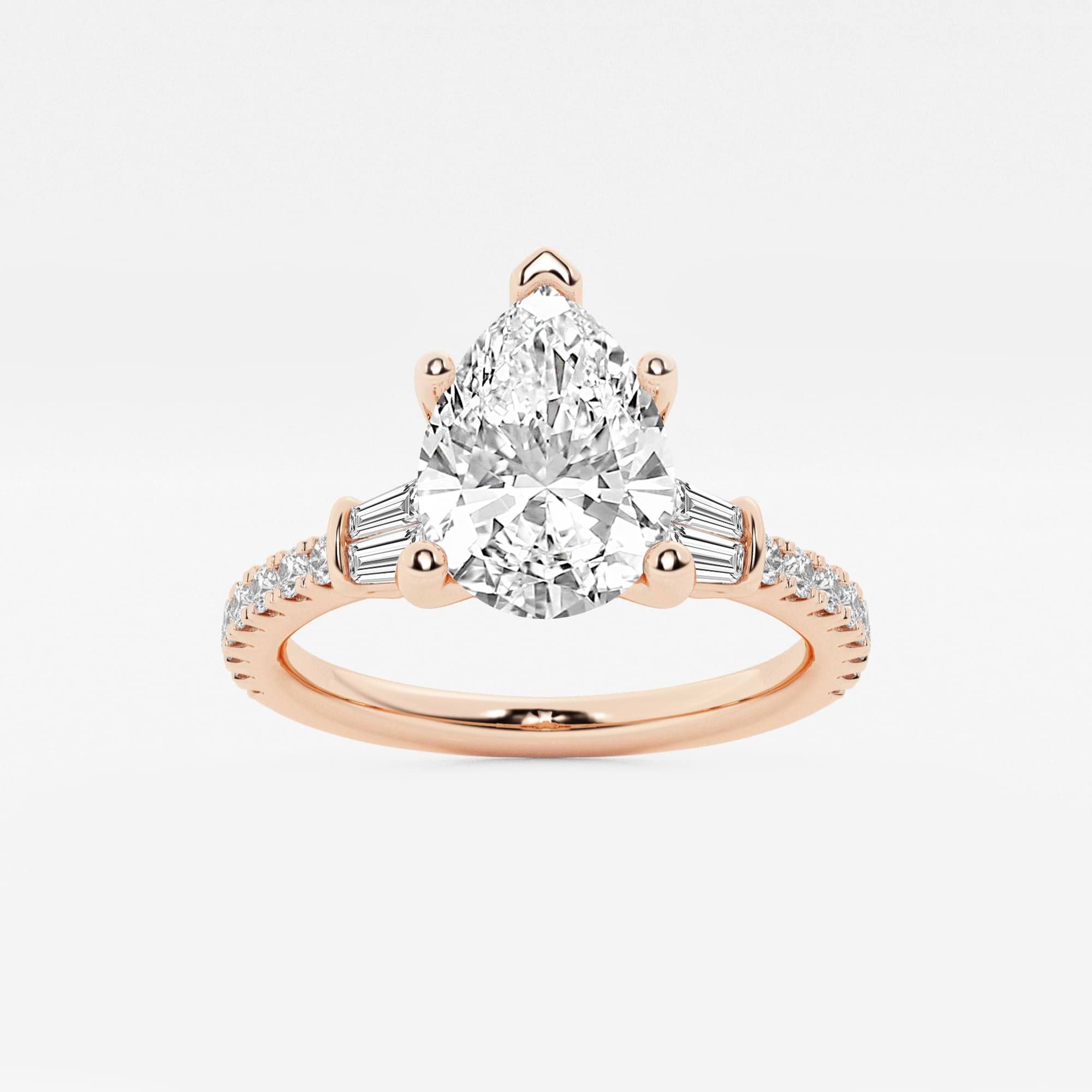 Pear-Cut Diamond Ring with Tapered Baguette and Pavé Accents