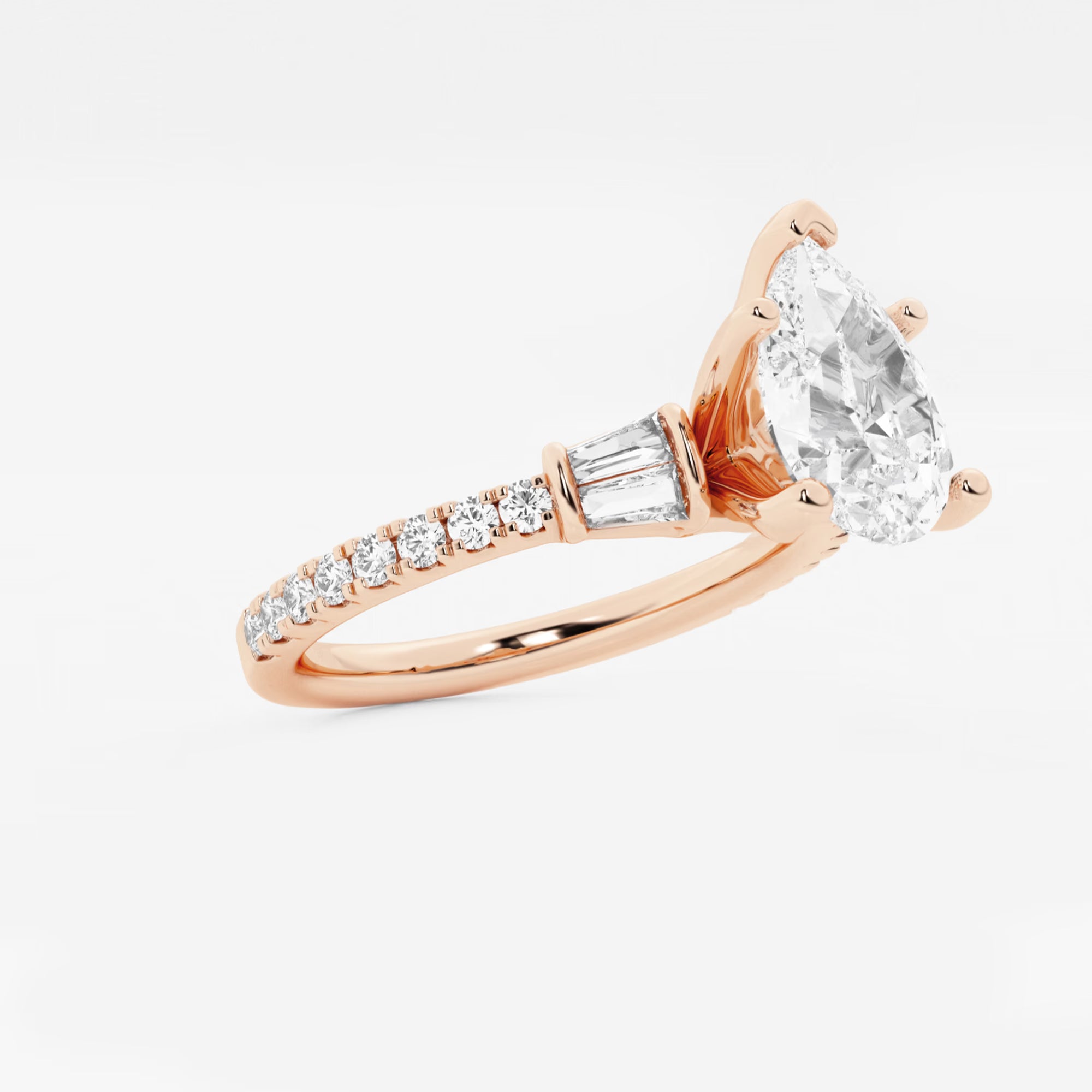 Pear-Cut Diamond Ring with Tapered Baguette and Pavé Accents