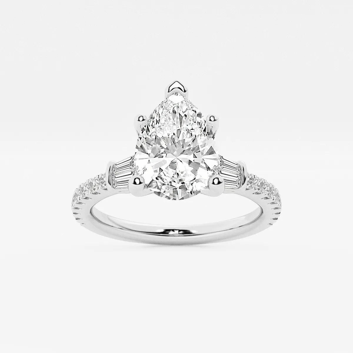 Pear-Cut Diamond Ring with Tapered Baguette and Pavé Accents