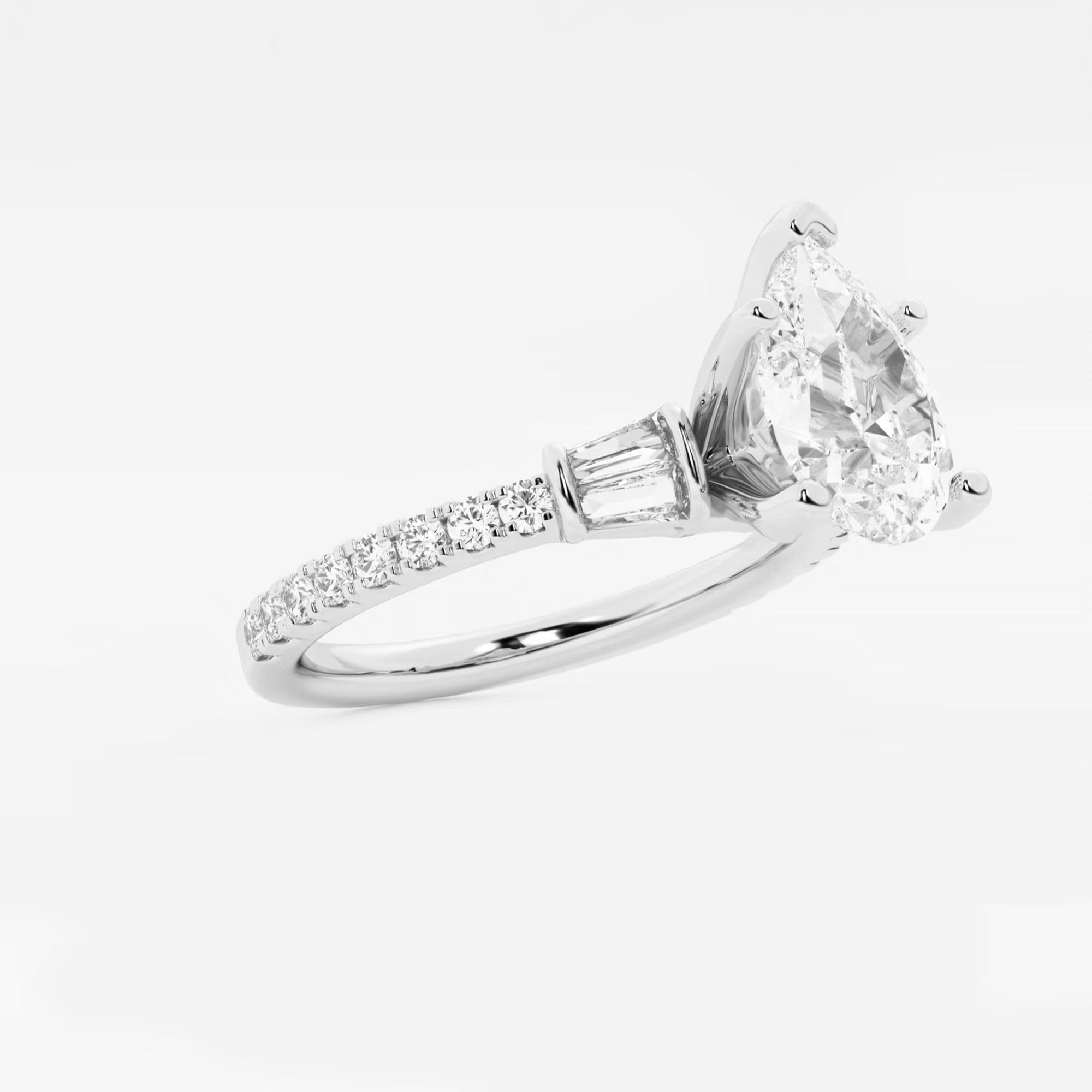 Pear-Cut Diamond Ring with Tapered Baguette and Pavé Accents