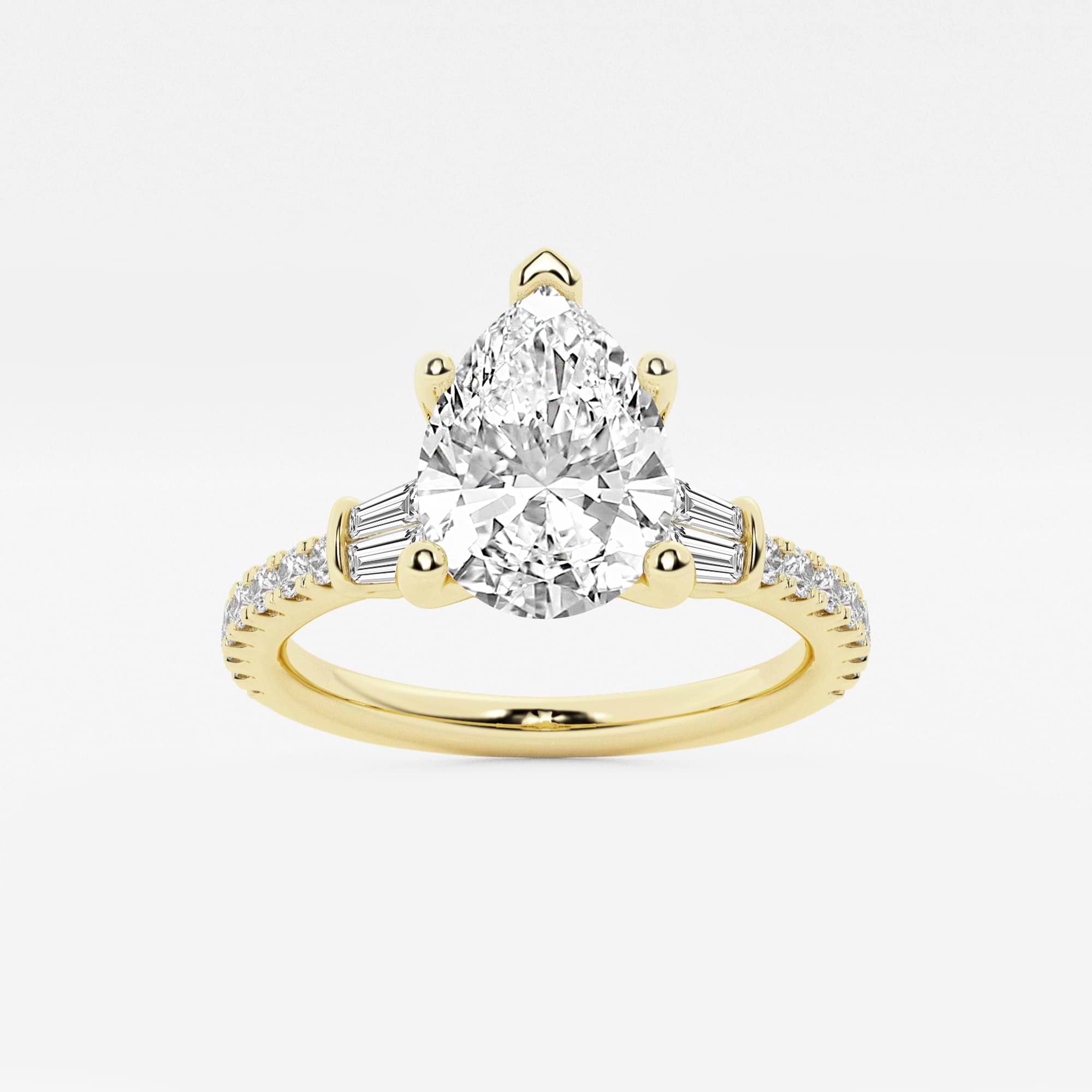 Pear-Cut Diamond Ring with Tapered Baguette and Pavé Accents
