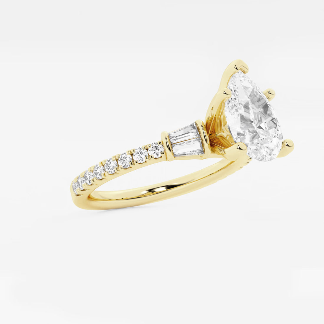 Pear-Cut Diamond Ring with Tapered Baguette and Pavé Accents