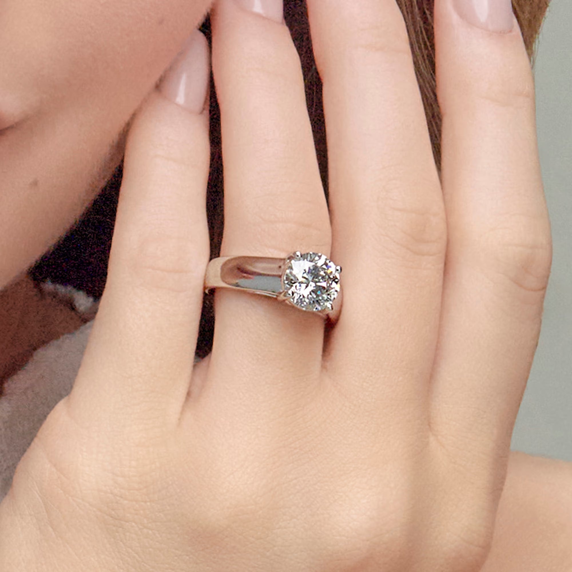 Bold Tapered Solitaire Engagement Ring in White Gold with Round Brilliant Center Stone